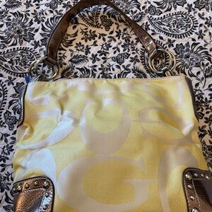 Chic Butter Yellow Shoulder Bag with Silver Hardware Accents